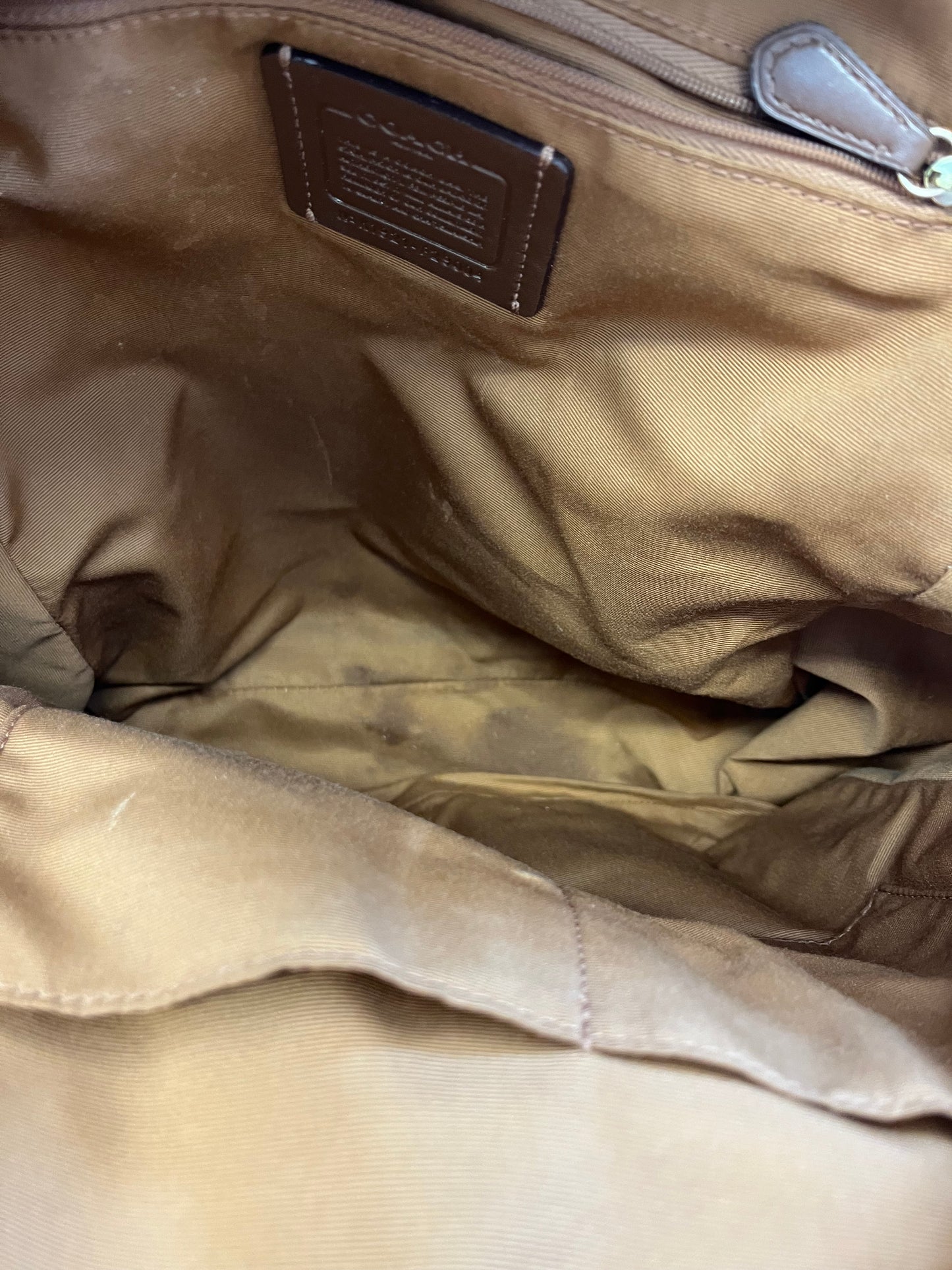 Tan Coach backpack